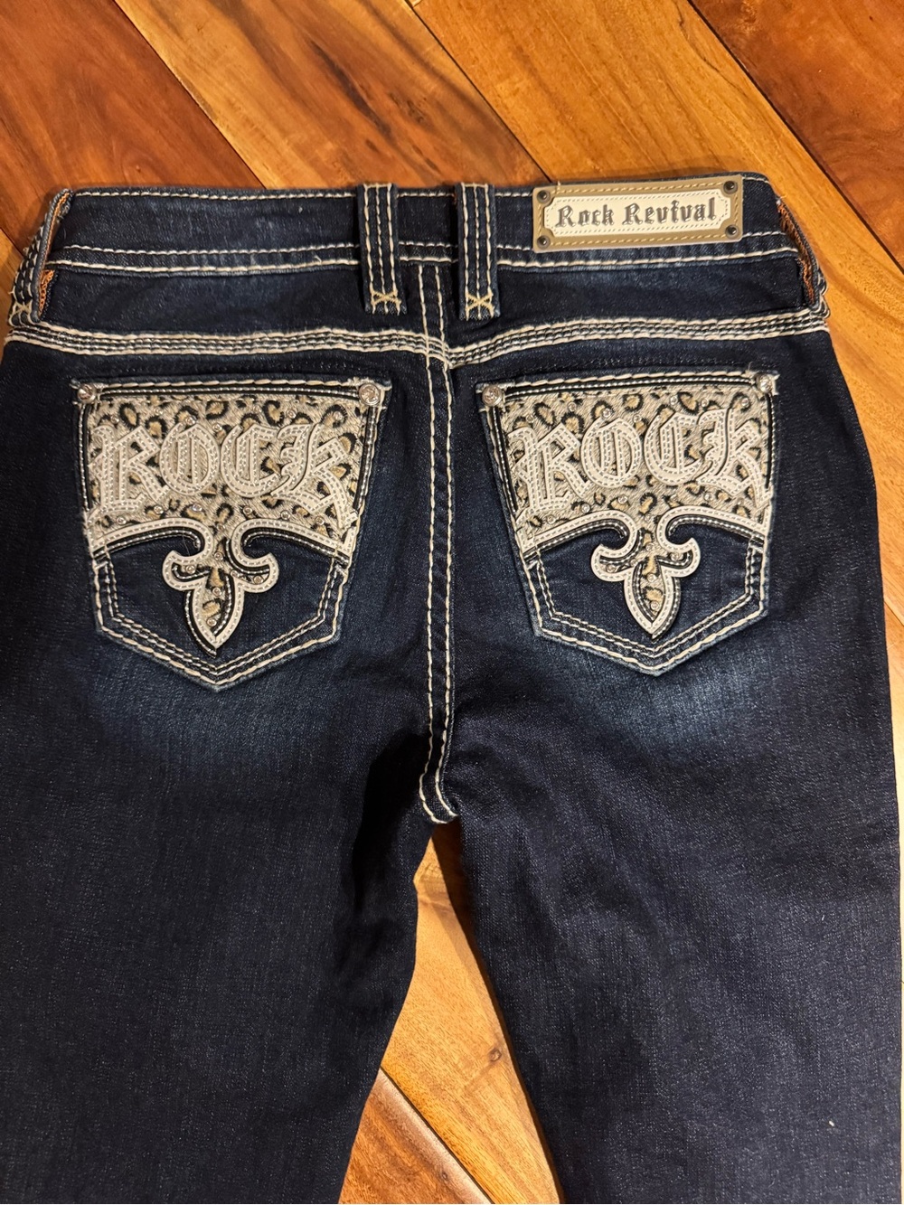 Rock Revival Women’s Dark Blue Skinny Jeans with Ivory Embroidered Pockets